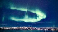 Aurora over Russeluft town, northern Norway