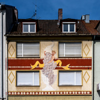Decorative mural commemorating a local resident, Peter Eisel