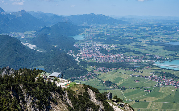 View of Tegelbergbahn mountain station and valley beneath