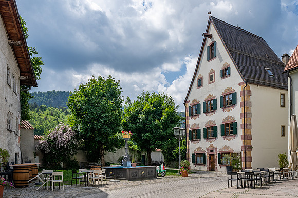 Historic building featuring Lüftlmalerei (intricate facade fresco paintings)
