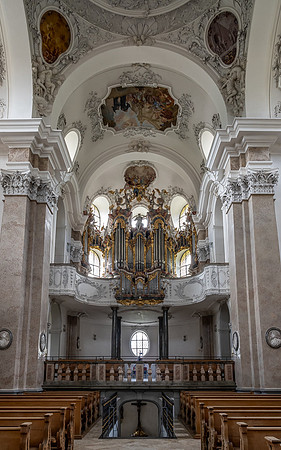 View of the organ at the rear of the church and steps leading down to the crypt