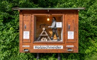 A roadside woodcutter's machine offering souvenir offcuts