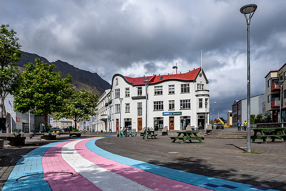 Painted Pavement leads to a historic white building known as The Bookstore