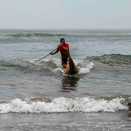 Huanchaco - demonstration of traditional fishing boat
